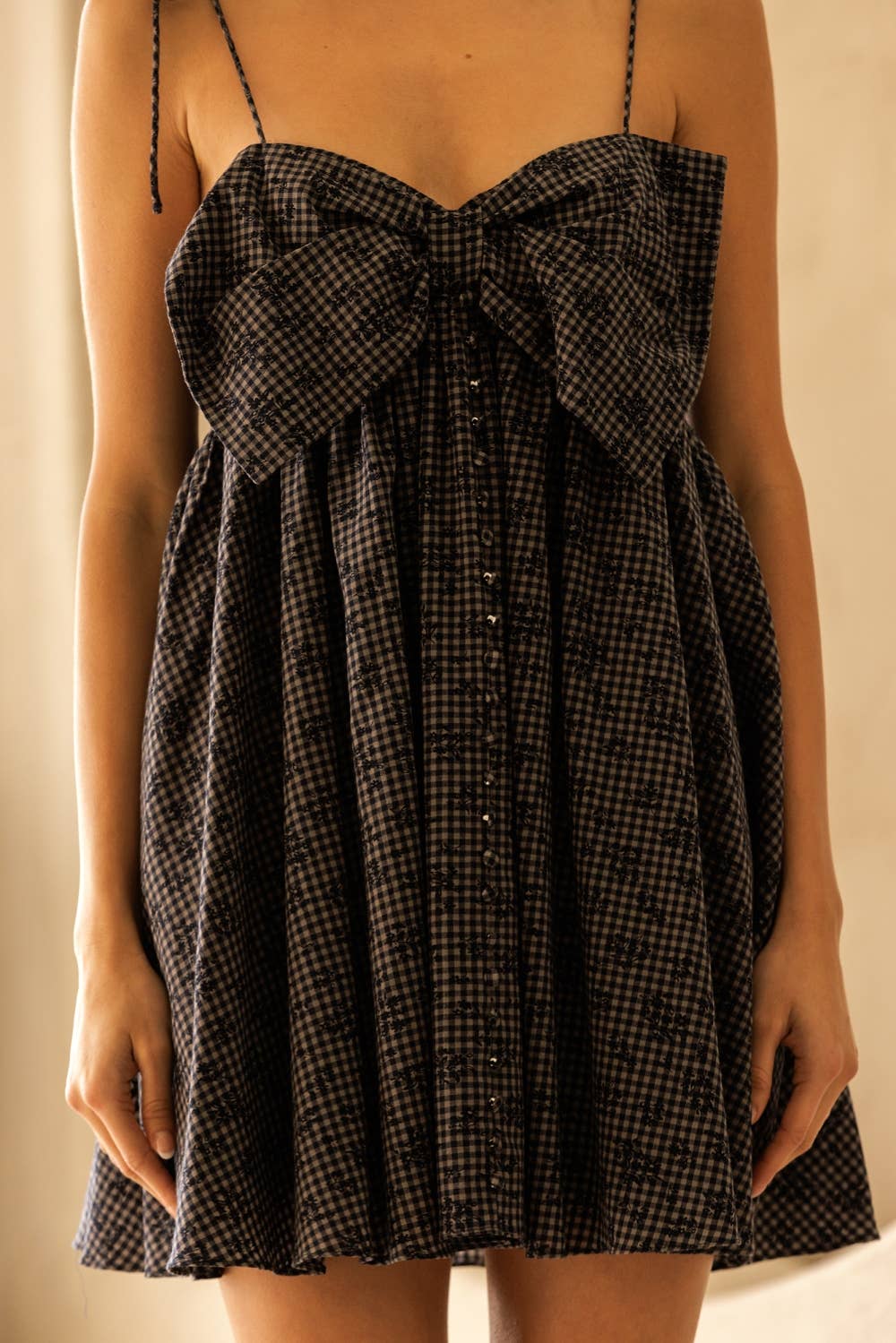 EMBROIDERED LARGE BOW BABY DOLL MINI DRESS